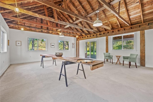 game room with vaulted ceiling, concrete flooring, wooden ceiling, and plenty of natural light