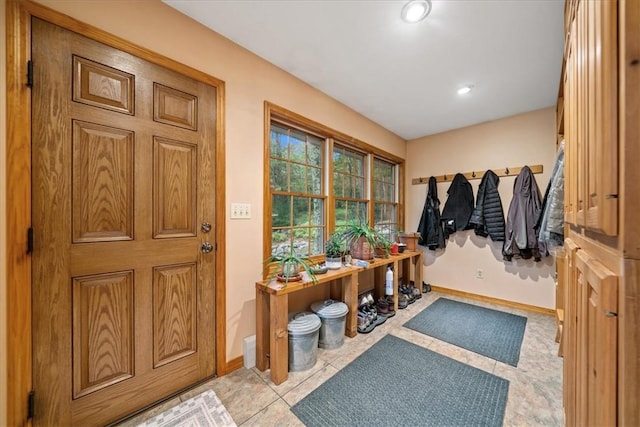 mudroom featuring light tile patterned floors