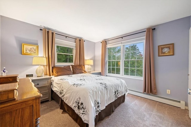 bedroom with light colored carpet and a baseboard radiator