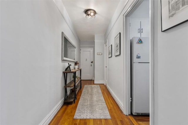 hallway featuring light hardwood / wood-style flooring