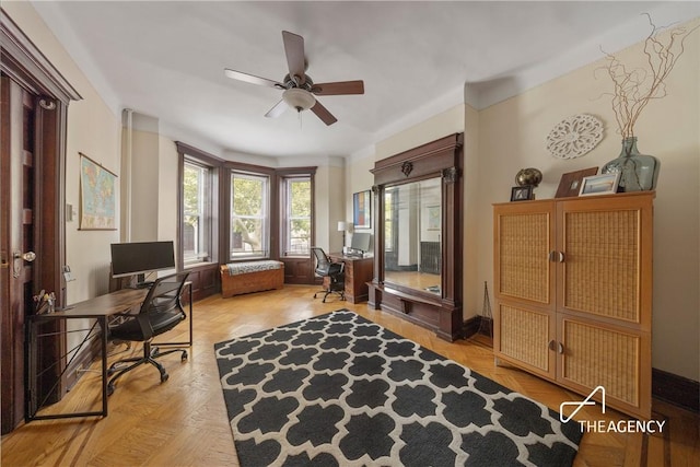 office space featuring light parquet flooring and ceiling fan