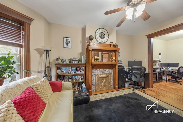 office space with hardwood / wood-style floors and ceiling fan