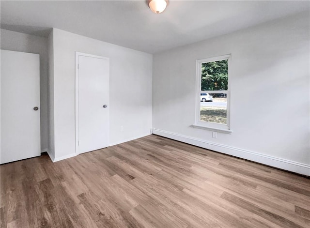 empty room featuring hardwood / wood-style floors