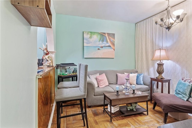 living room featuring an inviting chandelier and light parquet flooring