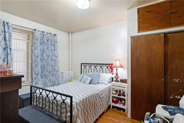 bedroom featuring wood-type flooring