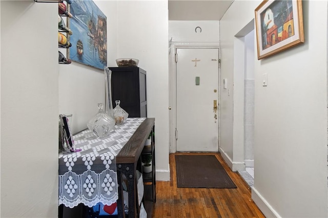 interior space with dark hardwood / wood-style flooring