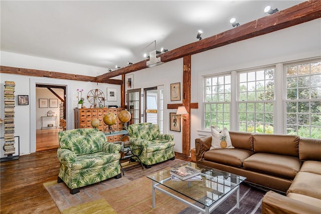 living room with hardwood / wood-style floors and beam ceiling