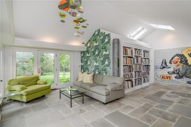 living area with high vaulted ceiling