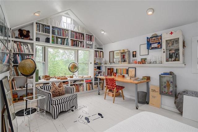 office space featuring a healthy amount of sunlight and vaulted ceiling