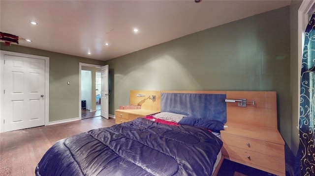 bedroom featuring dark wood-type flooring