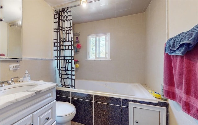 full bathroom featuring vanity, shower / tub combo, and toilet