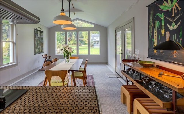 sunroom featuring a wealth of natural light and lofted ceiling