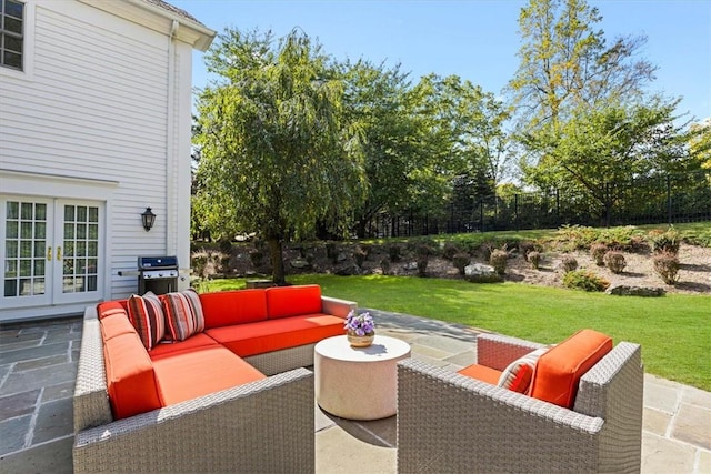 view of patio featuring an outdoor hangout area, french doors, area for grilling, and fence