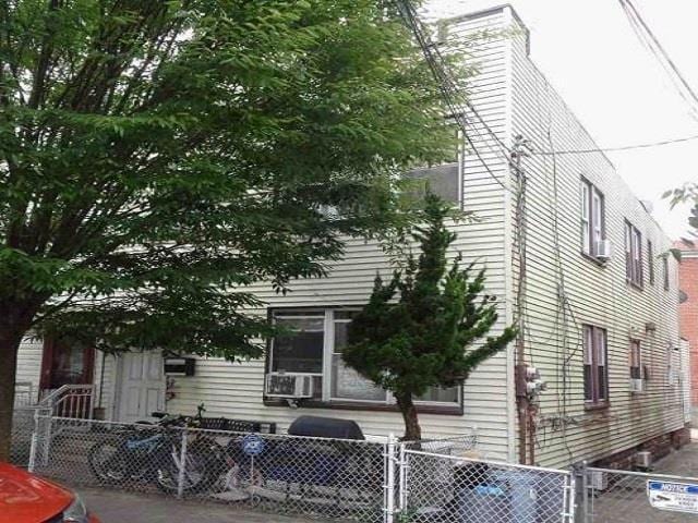 1644 E 96th St, Brooklyn, NY 11236 - rear view of house with a gate