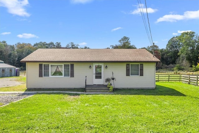 view of front of home featuring a front lawn