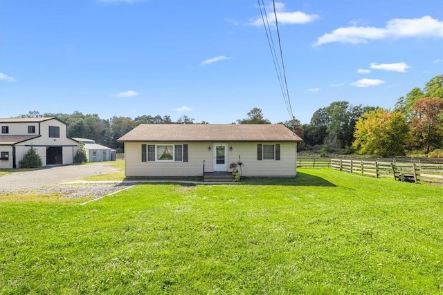 view of front of home with a front lawn