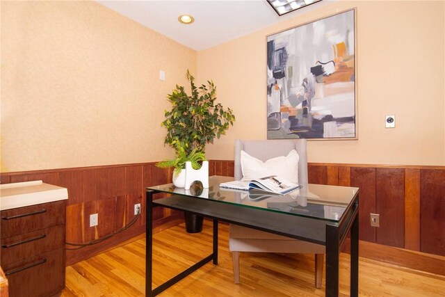 office space with light wood-type flooring