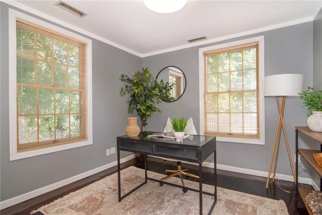 office with crown molding and dark wood-type flooring