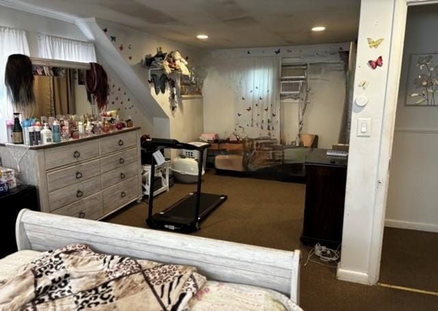 bedroom featuring dark carpet and ornamental molding