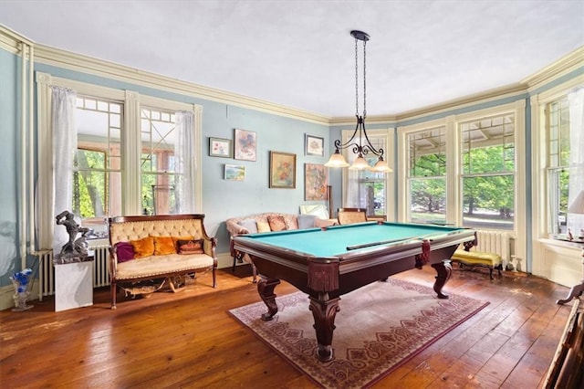 game room with hardwood / wood-style flooring, billiards, ornamental molding, and radiator heating unit