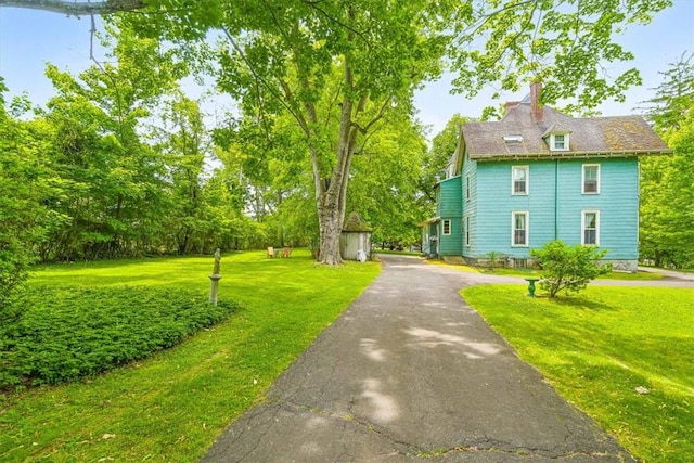 exterior space with a yard