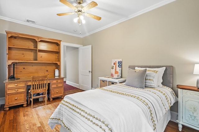 105 Walworth Ave, Scarsdale, NY 10583 - bedroom featuring crown molding, wood finished floors, a desk, a ceiling fan, and baseboards
