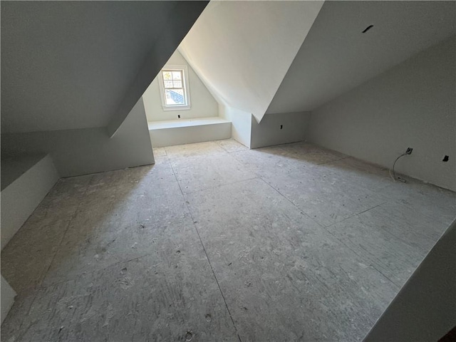 bonus room with lofted ceiling