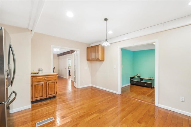 dining area with light hardwood / wood-style flooring