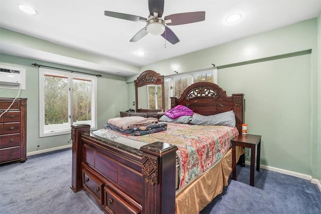 bedroom featuring carpet, ceiling fan, and a wall mounted air conditioner