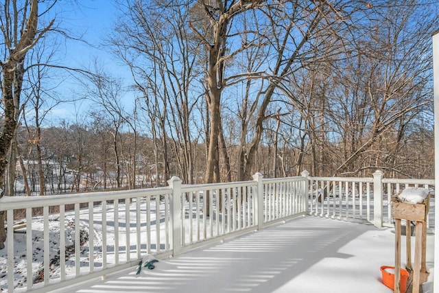 view of snow covered deck