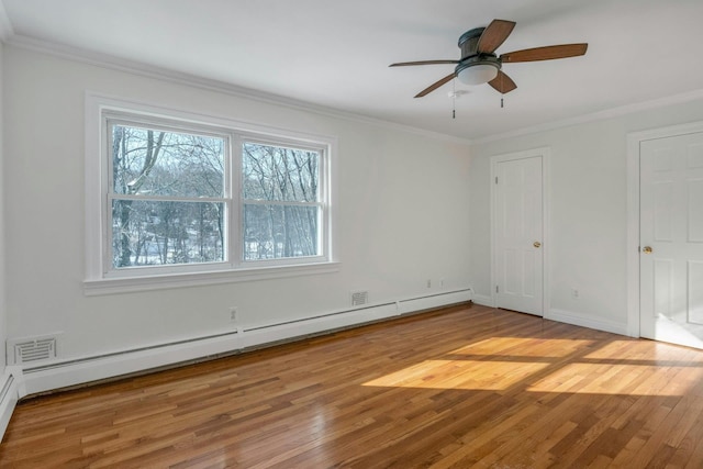 unfurnished bedroom featuring crown molding, a baseboard radiator, and light hardwood / wood-style floors