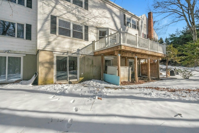 exterior space featuring a wooden deck