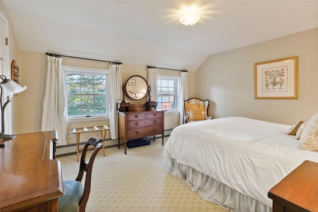 bedroom featuring lofted ceiling, light colored carpet, and baseboard heating