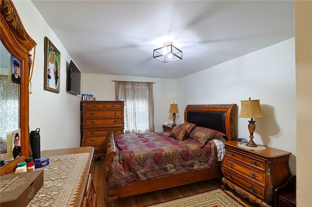 bedroom featuring hardwood / wood-style floors