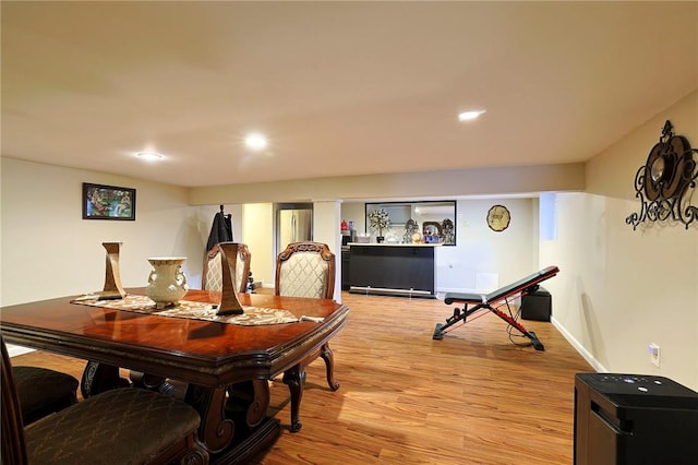 dining area featuring light wood-type flooring