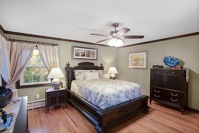 bedroom featuring ceiling fan, crown molding, light hardwood / wood-style floors, and a baseboard heating unit