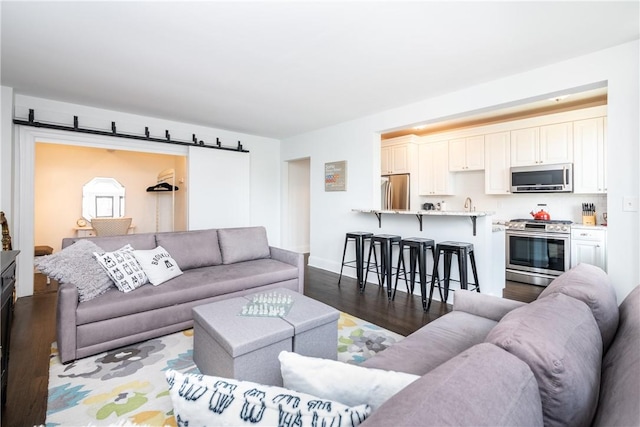 living room with dark wood-type flooring