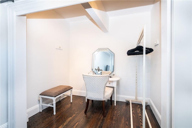 corridor with dark hardwood / wood-style flooring