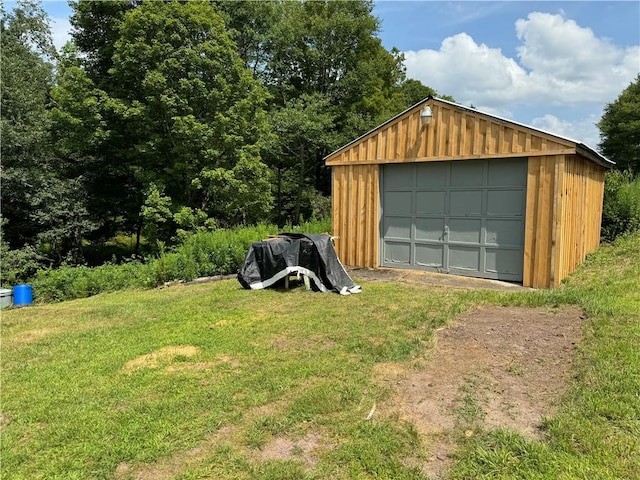 garage with a lawn