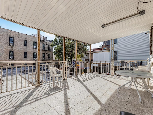 view of patio / terrace with a balcony