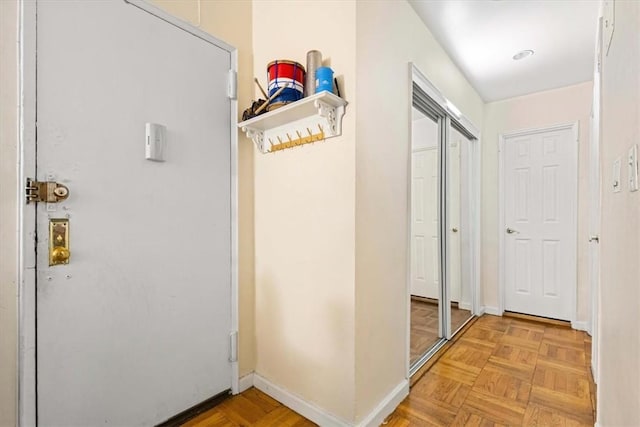 hallway with light parquet floors