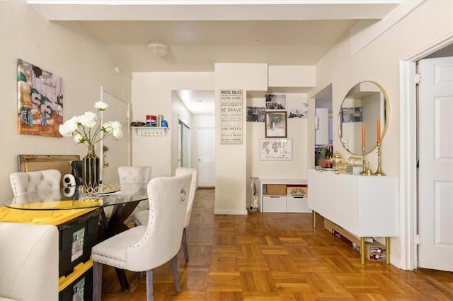 dining area with parquet floors