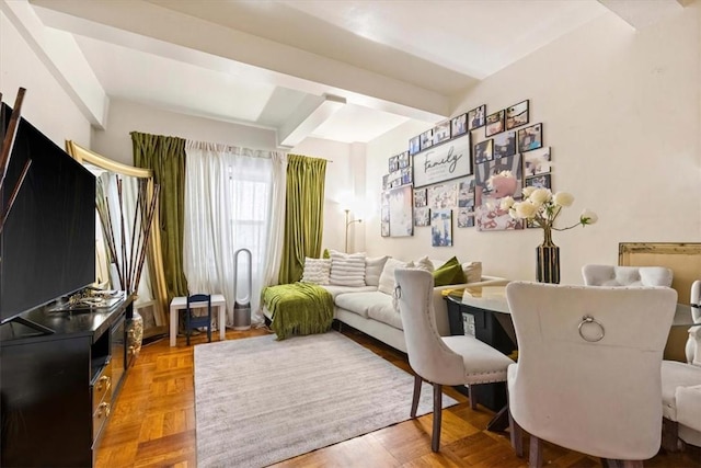 sitting room with parquet flooring and beam ceiling