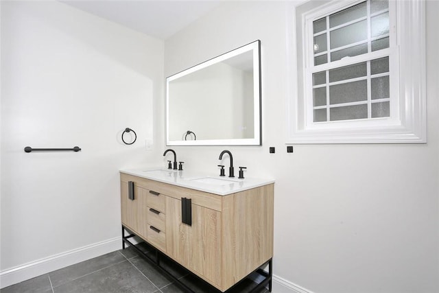 bathroom featuring tile patterned floors and vanity