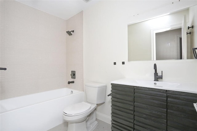 full bathroom featuring vanity, toilet, and tiled shower / bath