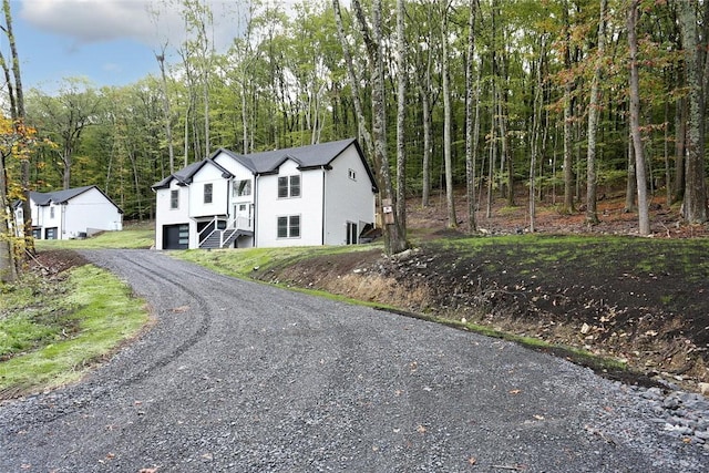 view of front of property with a garage