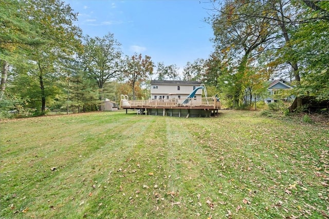 view of yard with a deck