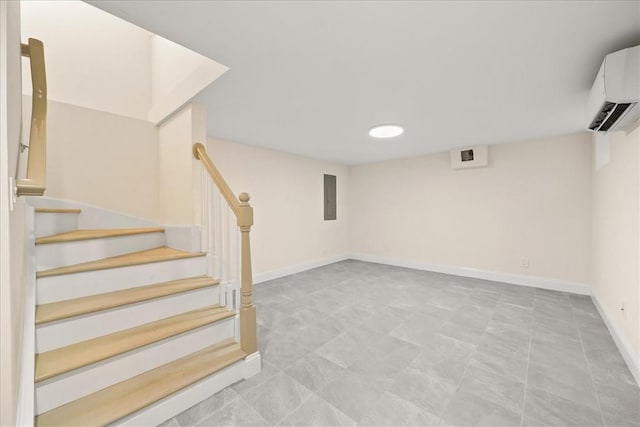 basement featuring a wall unit AC