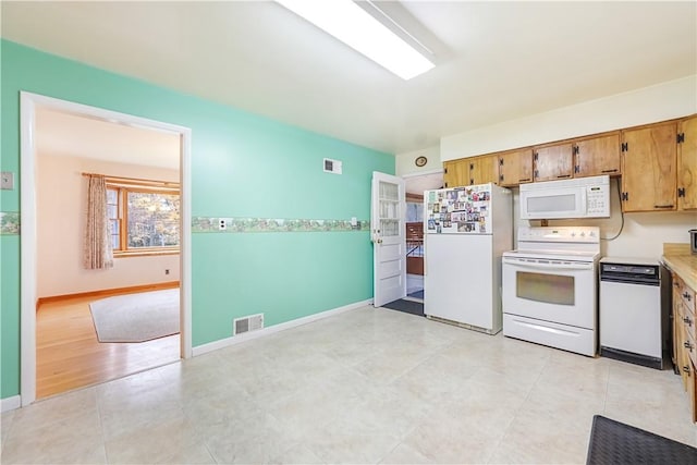 kitchen featuring white appliances