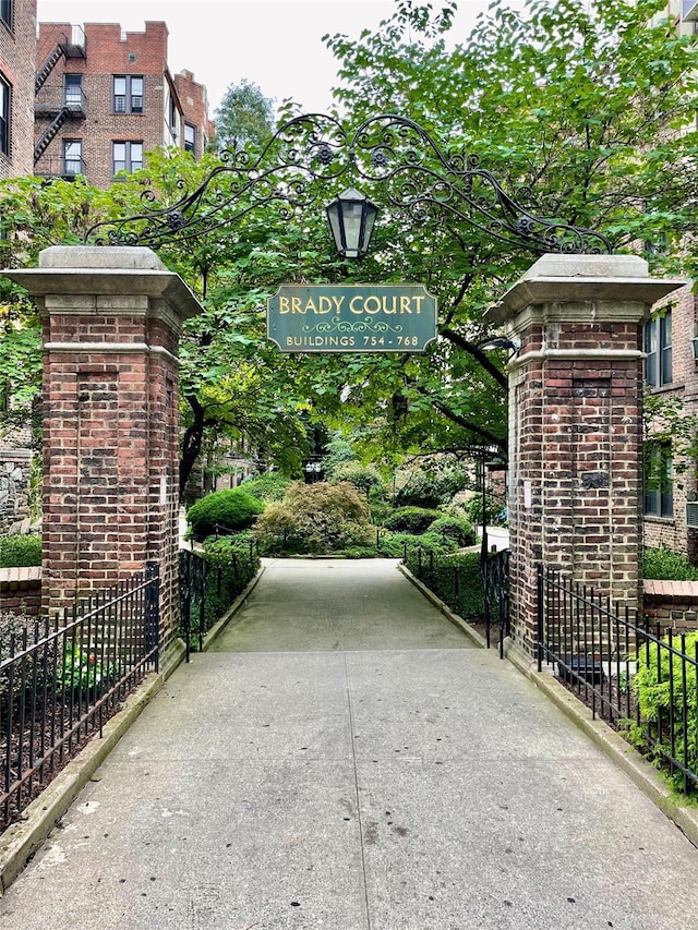 view of gate with fence